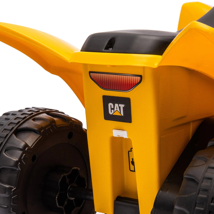CAT ride-on toy rear view showing yellow body, black seat, and textured wheels on white background.