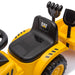 CAT ride-on construction toy with black seat and working shovel, shown on a white background.