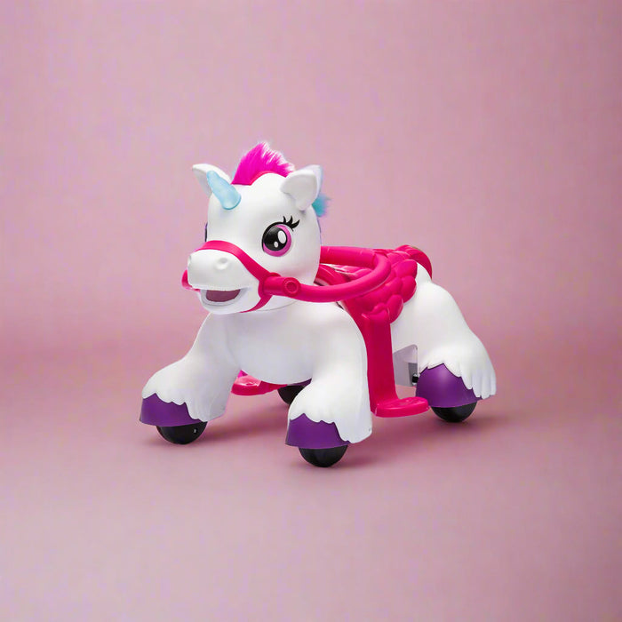 Unicorn ride-on toy walker for toddlers shown on a pink background.