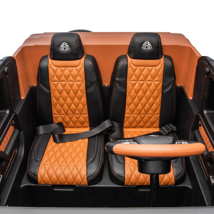 FR8913 kids ride-on car shows two orange and black seats with seat belts and a matching steering wheel.