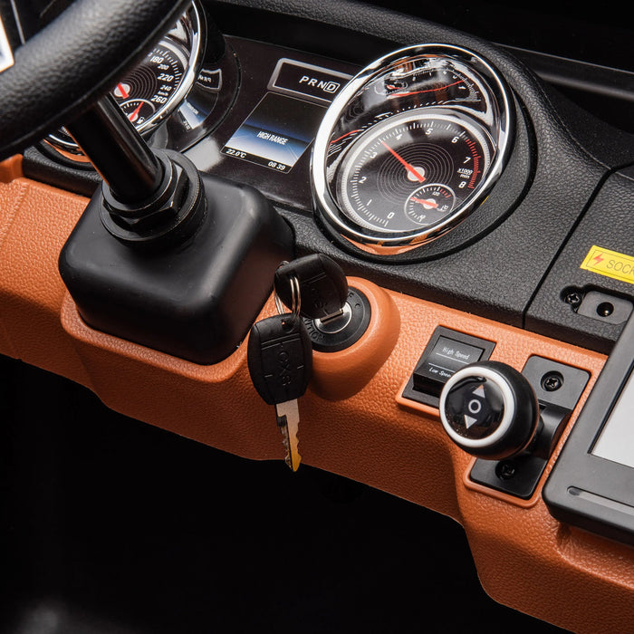 FR8913 black dashboard with ignition key, speedometer, and control buttons close up.