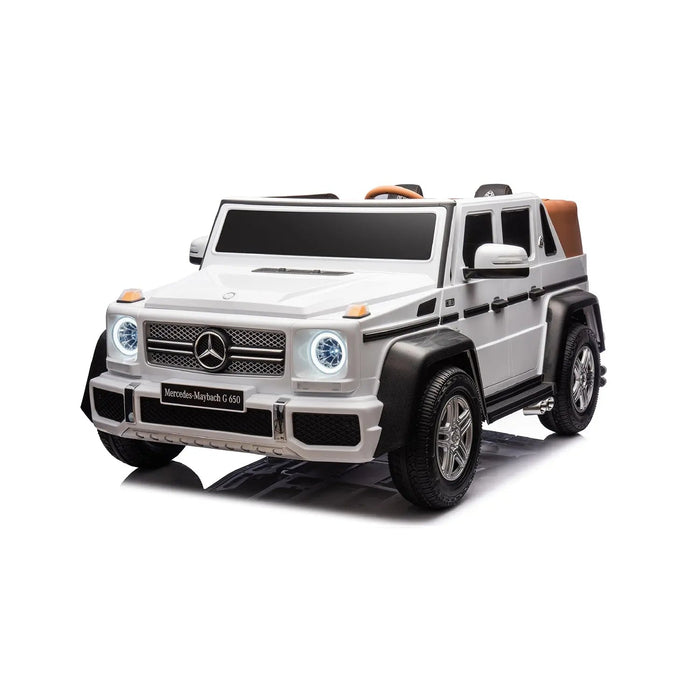 Mercedes-Maybach G650 white kids ride-on car shown in a studio setting with headlights on.