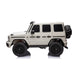 White toy SUV car with black wheels displayed on a plain white background.