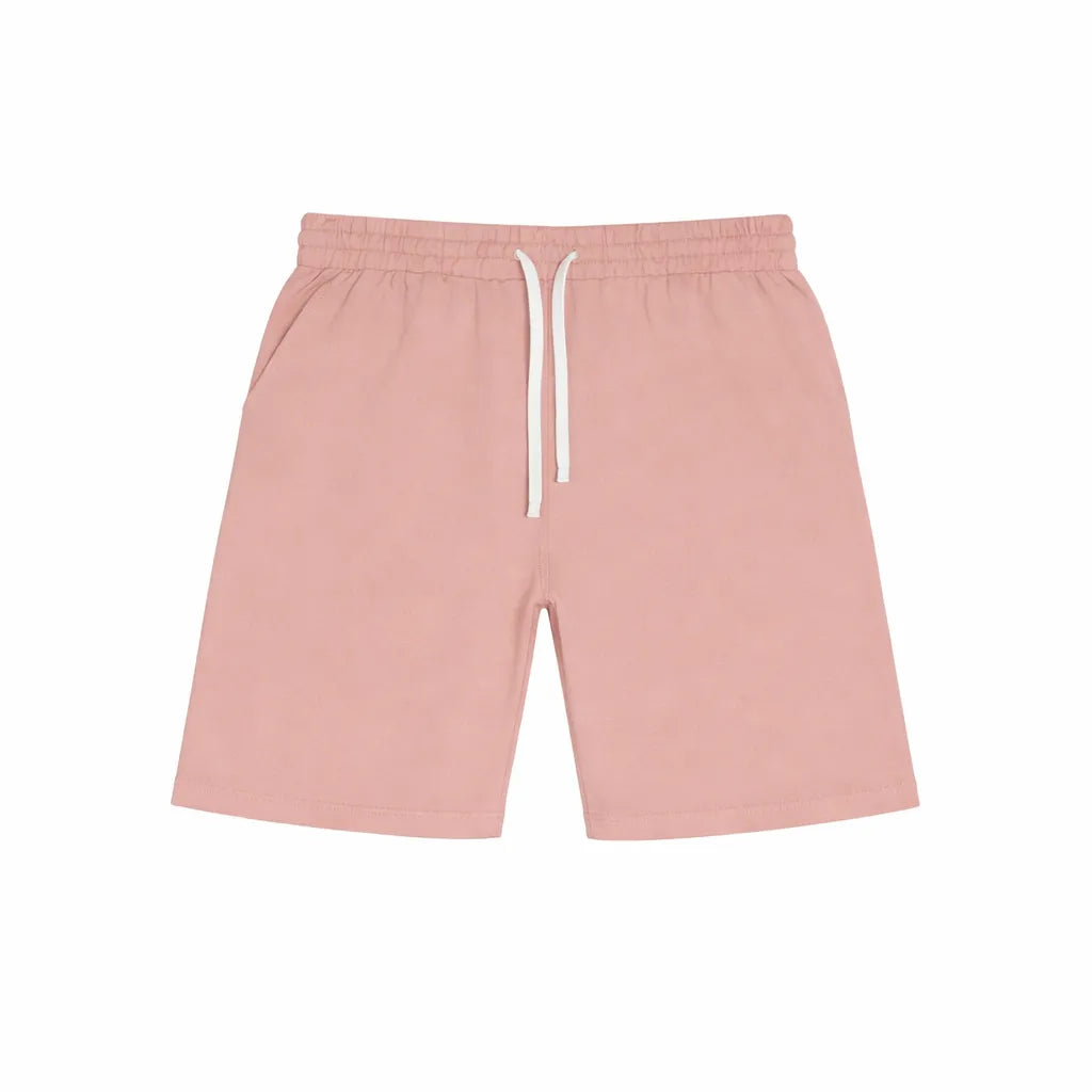 Factory Fleece kids cotton sweat shorts in light pink laid flat on a white background.