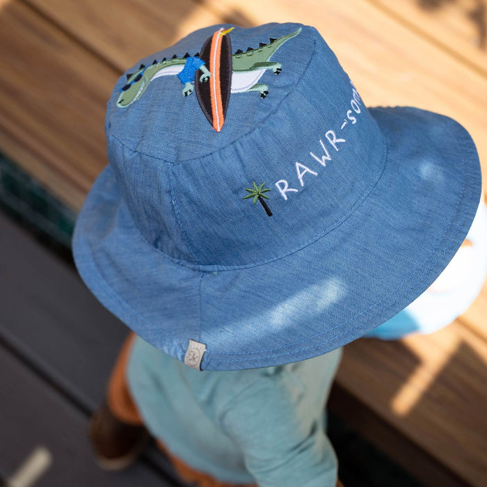 Chapeau de soleil réversible anti-UV UPF50+ FlapJack Kids® pour enfants - Dino Surfer