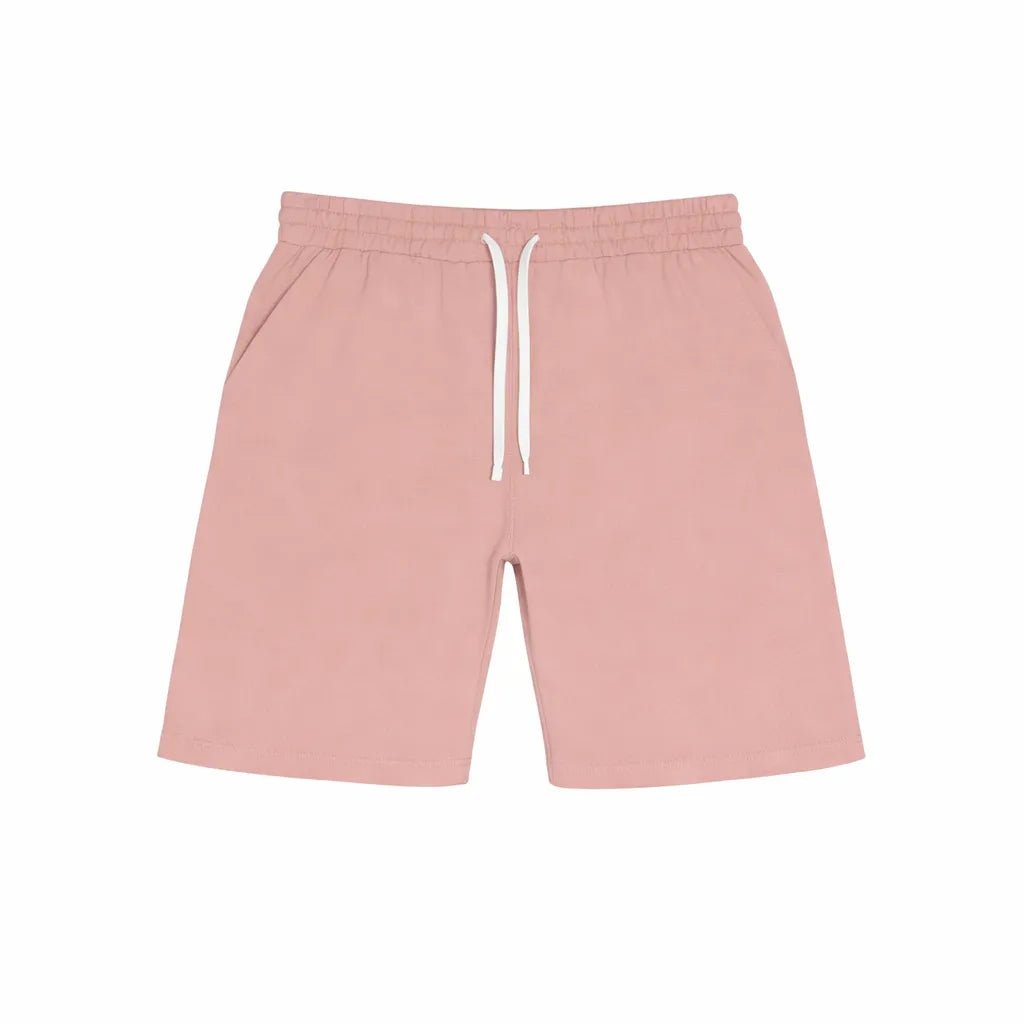 Fleece Factory youth boys' sweat shorts in light pink with white drawstring, displayed flat.