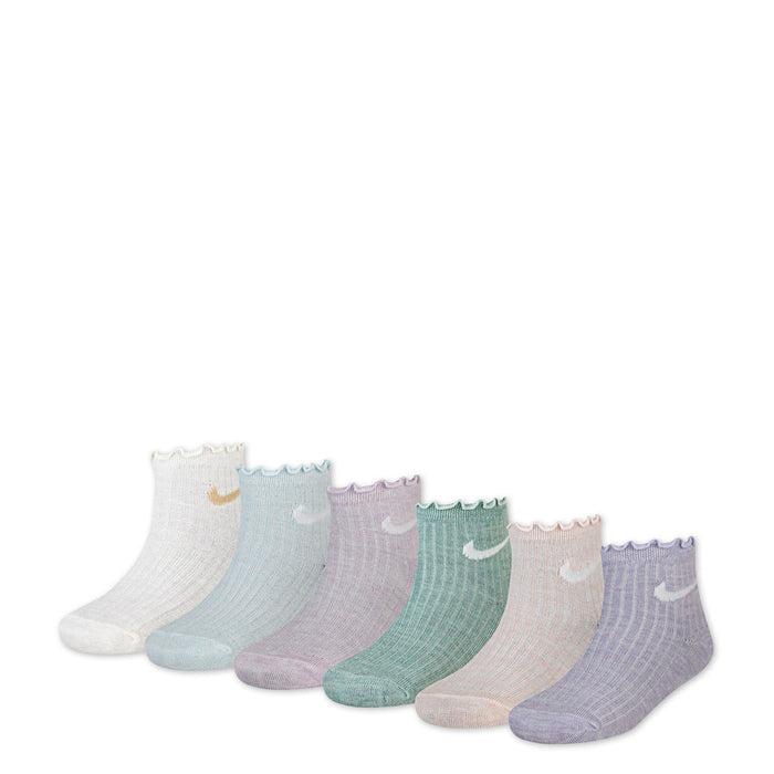 Nike baby socks six-pack in assorted pastel colors displayed side by side on a white background.