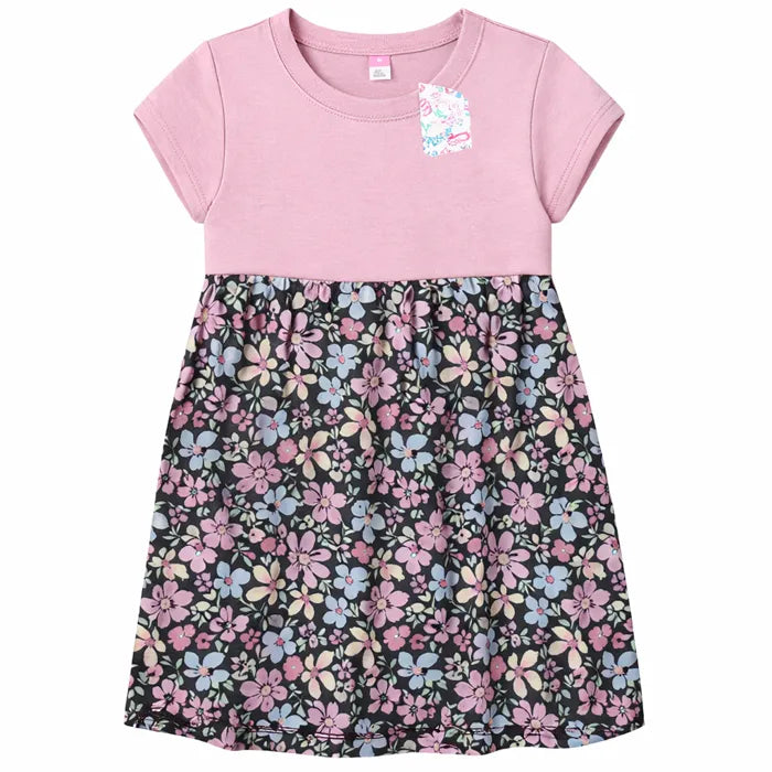 GuiliGuili roseate spoonbill baby dress with pink top and floral skirt shown on a plain background.