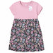 GuiliGuili roseate spoonbill baby dress with pink top and floral skirt shown on a plain background.