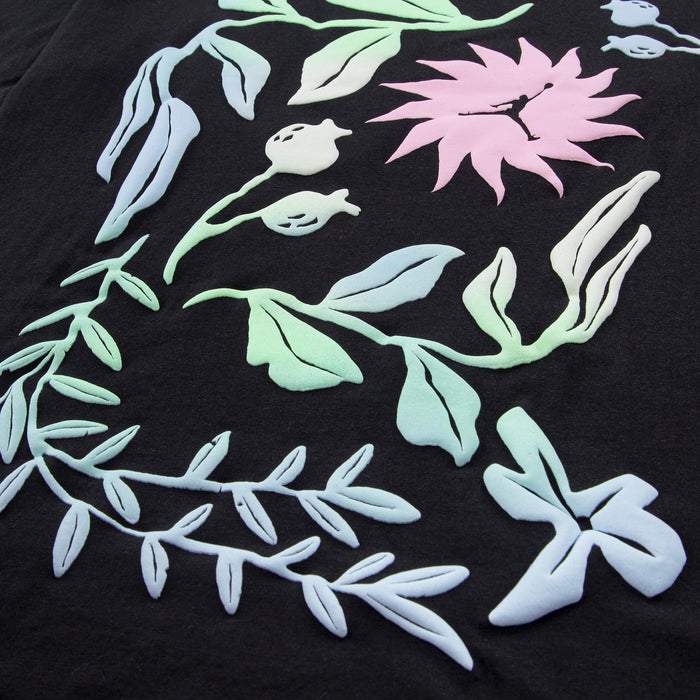JOR-45F489-023 t-shirt close-up showing pastel floral print on black fabric