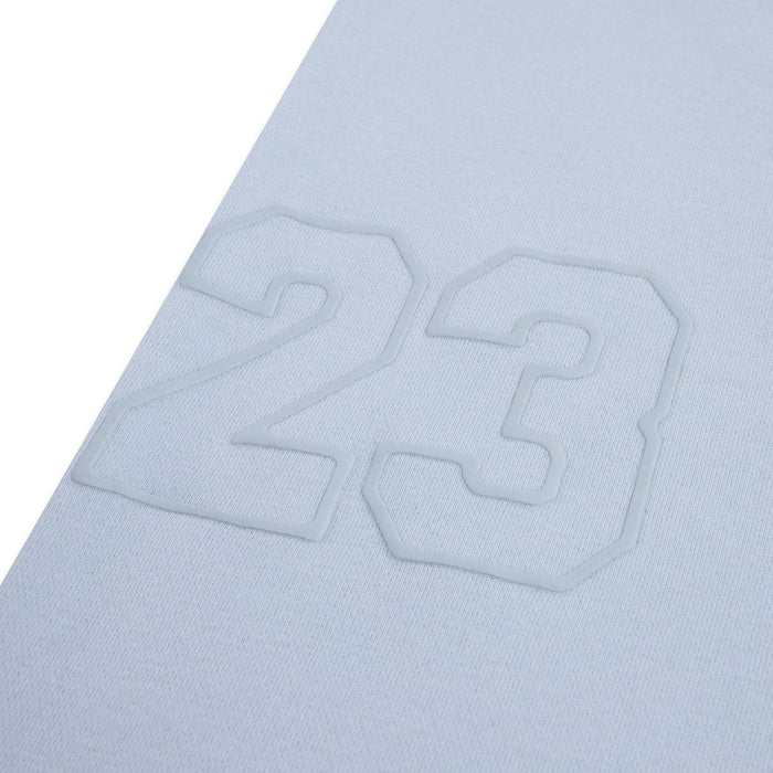 Light blue kids' shirt with embossed number 23 detail shown up close.