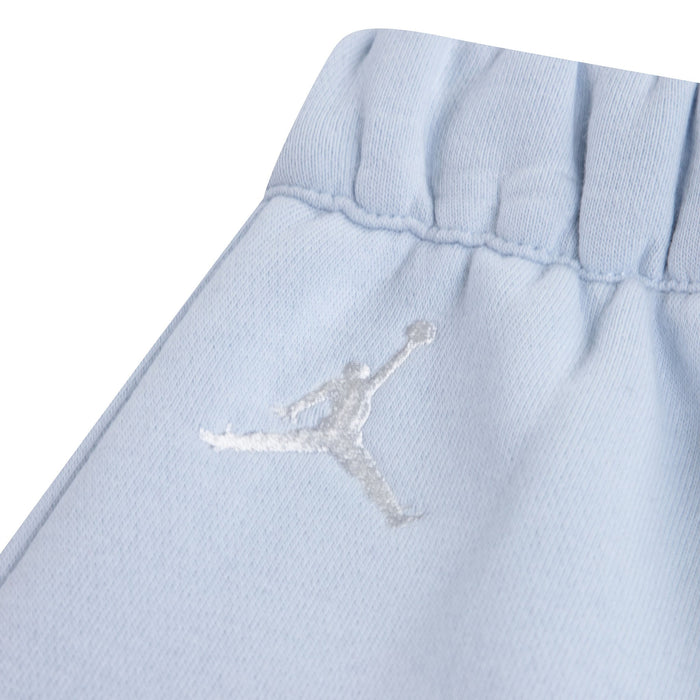 Jordan baby blue sweatpants close-up showing elastic waistband and embroidered logo.
