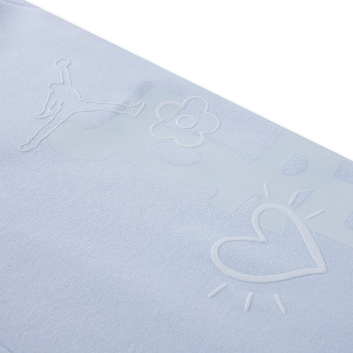 Jordan baby blue sweatshirt featuring embossed logo, flower, and heart detail on fabric.