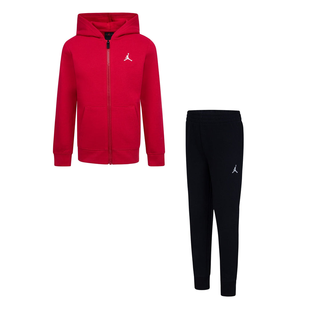 Jordan kids red hooded zip-up sweatshirt and black jogger pants set on a white background.