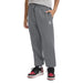 Jordan kids' grey sweatpants shown on a child with hands in pockets, front view.