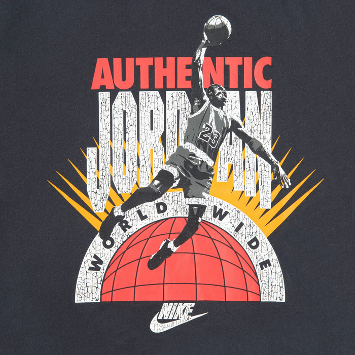 Jordan shirt with basketball player graphic, red and white text, and Nike logo on black fabric.