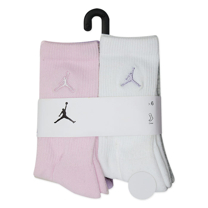 Jordan kids crew socks in pastel pink, white, and grey, displayed in retail packaging on a hanger.