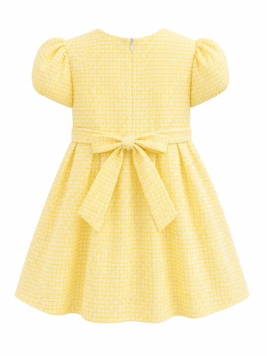 Kids Energy Yellow Dress displayed from the back with a bow and puff sleeves on a white background.