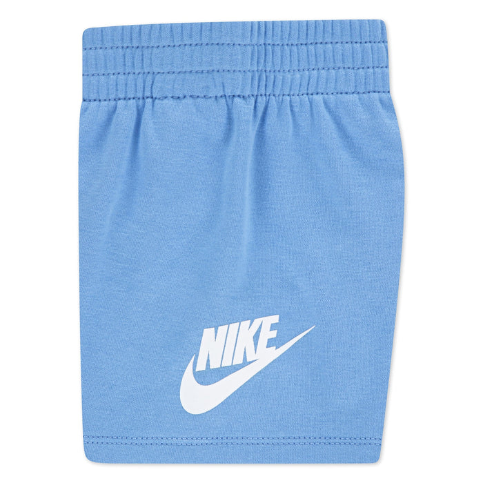 Nike baby blue shorts with elastic waistband and white logo displayed flat on a white background.