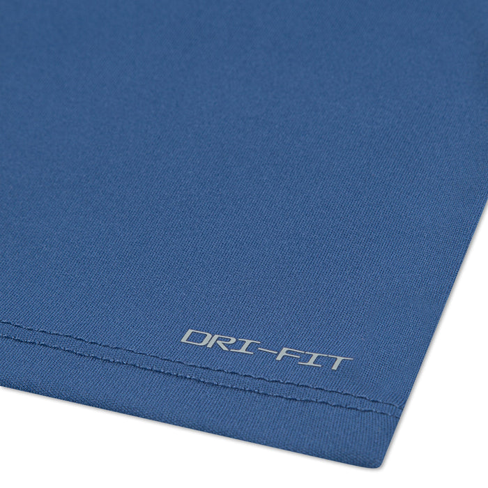 Nike Dri-FIT blue fabric close-up showing hem and Dri-FIT logo text in the corner.
