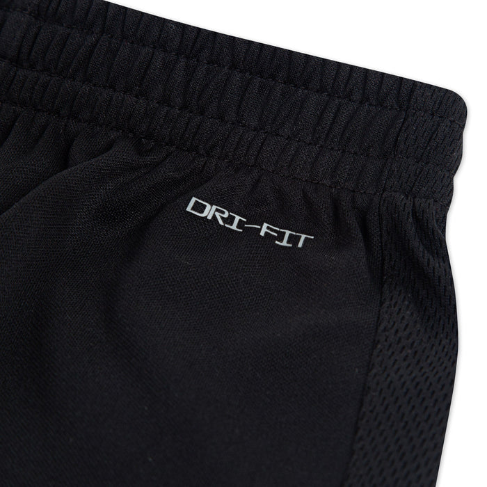 Nike Dri-Fit black athletic shorts close-up showing waistband and mesh fabric detail.