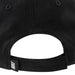 Nike black adjustable baseball cap showing rear strap and white logo tag close-up.