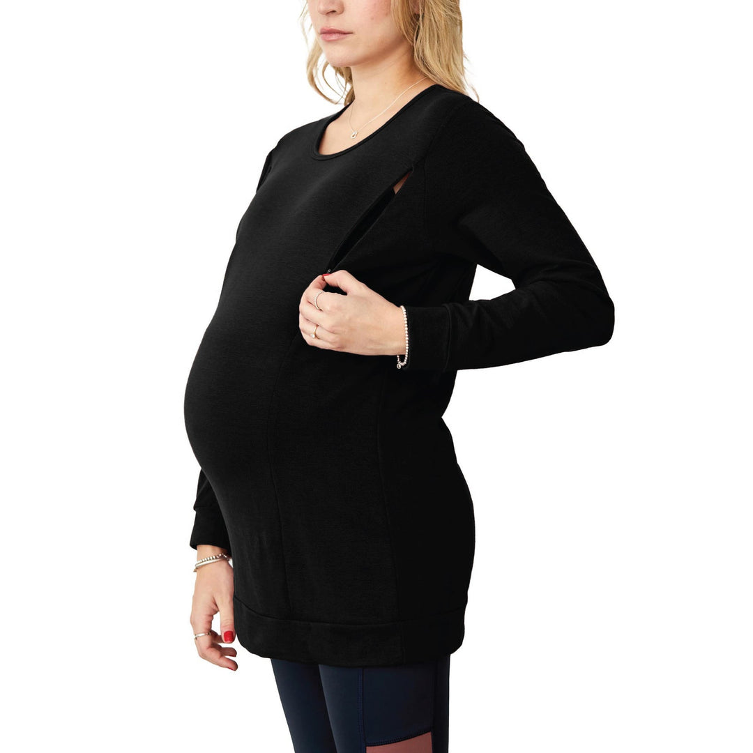 NIXI Black Zip maternity nursing top shown on a pregnant woman opening the side zipper