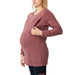 NIXI-ZIP maternity nursing top in mauve, shown on a pregnant woman unzipping the side panel.