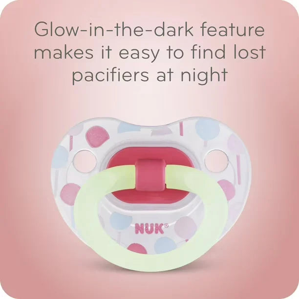 Featuring the Glow-in-the-dark Nuk Orthodontic pacifier on a pink background - Glow-in-te-dark feature makes it easy to find lost pacifiers at night