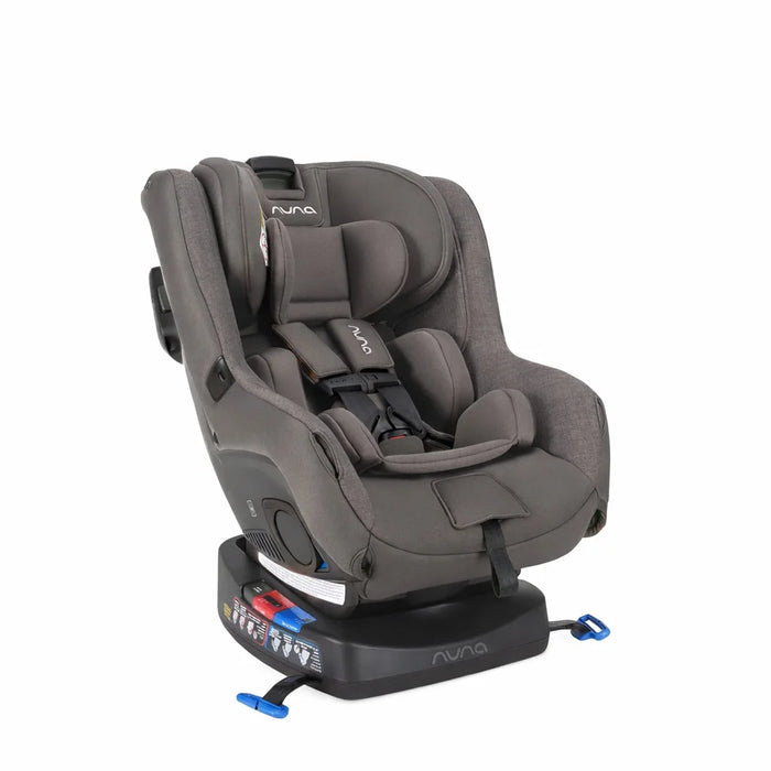 Nuna convertible car seat in grey shown at a slight angle with harness and base visible.