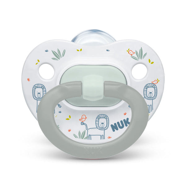 NUK baby pacifier with lion and bird illustrations shown upright on a white background.