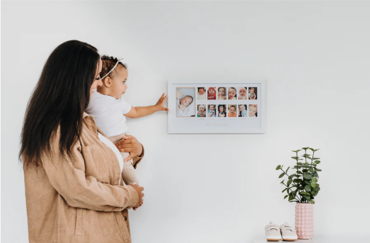 Pearhead® First Year Baby Milestone Photo Frame with Beige Mat