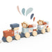 Wooden stacking train toy with monkey faces and colorful blocks on a white background.