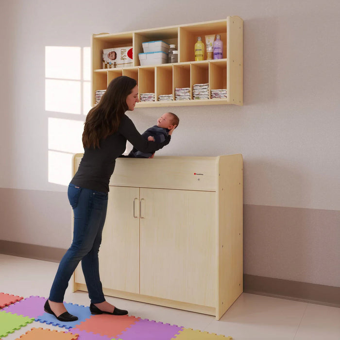 Foundations SafeSwing Changing Table – Natural finish wooden changing table