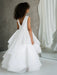 JK07 Pearl Back Horsehair Communion Dress shown on a girl standing in front of a mirror.
