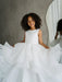 Sunny JK07 Pearl Back Horsehair Communion Dress worn by a young girl, shown twirling indoors.