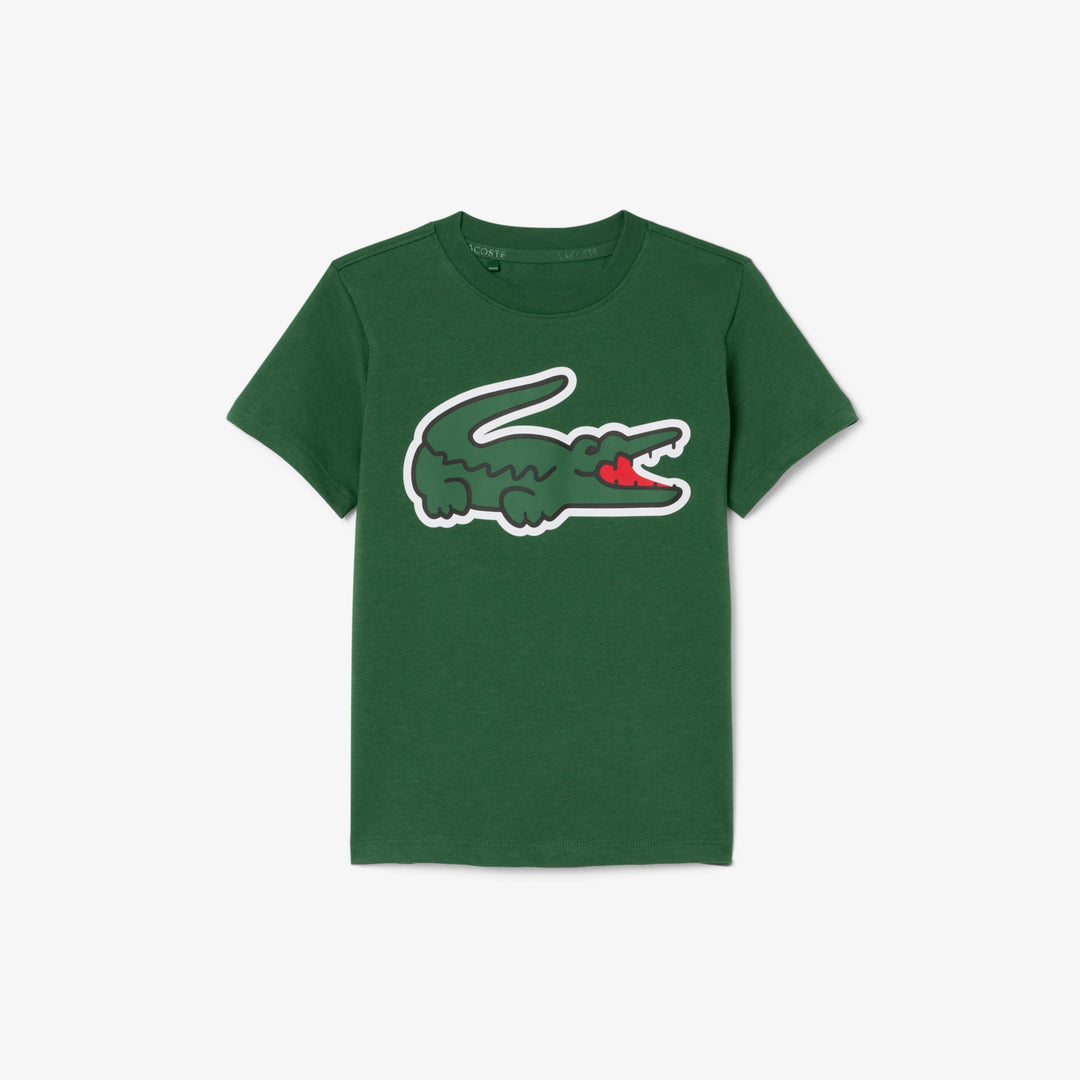 Kids' green t-shirt with a large cartoon crocodile graphic, displayed flat on a white background.
