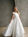 Teter Warm Charlotte Satin Communion Dress worn by a girl standing in a modern studio setting.
