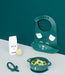 Green silicone baby bib and bowl set with animal face, teether, food, and milk carton
