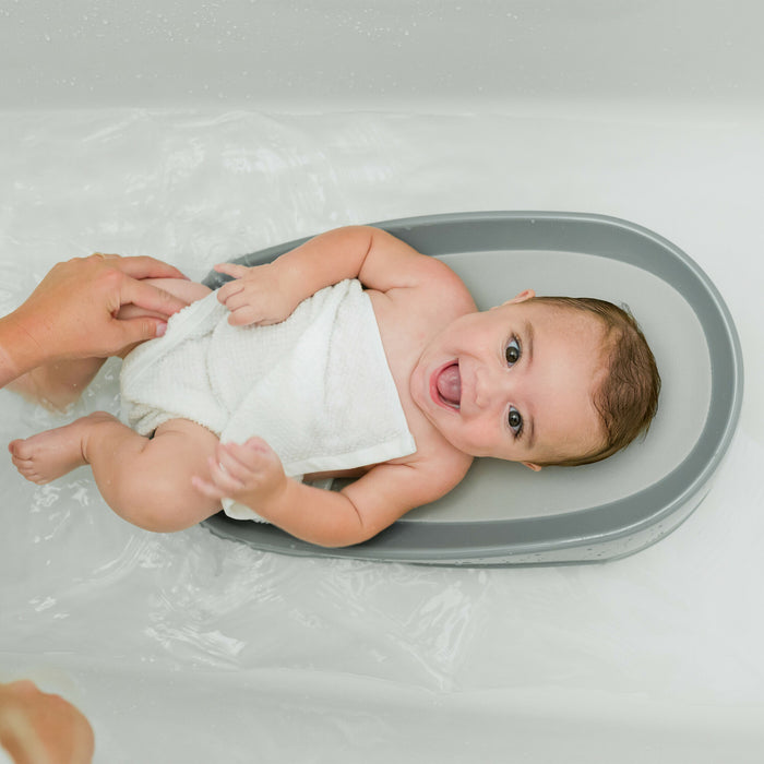 The First Years Sure Comfort™ Renewed Baby Bather – Baby Bath Support for Newborns & Infants