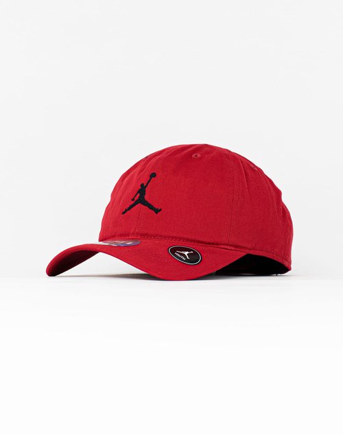 Air Jordan Curvebrim adjustable red hat with black Jumpman logo, displayed on white background.