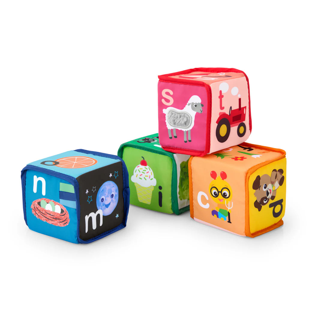b.box Alpha Skating Soft Blocks sensory toy set of four colorful cubes with playful illustrations on a white background.
