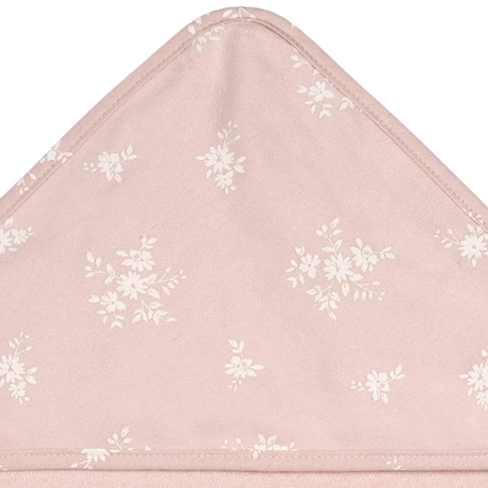 b.box hooded baby towel in rose with white floral pattern, shown close up on the hood corner.