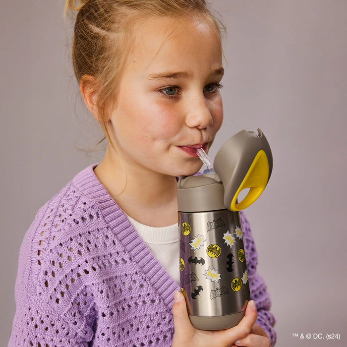 b.box insulated water bottle with Batman design being used by a child in a purple sweater