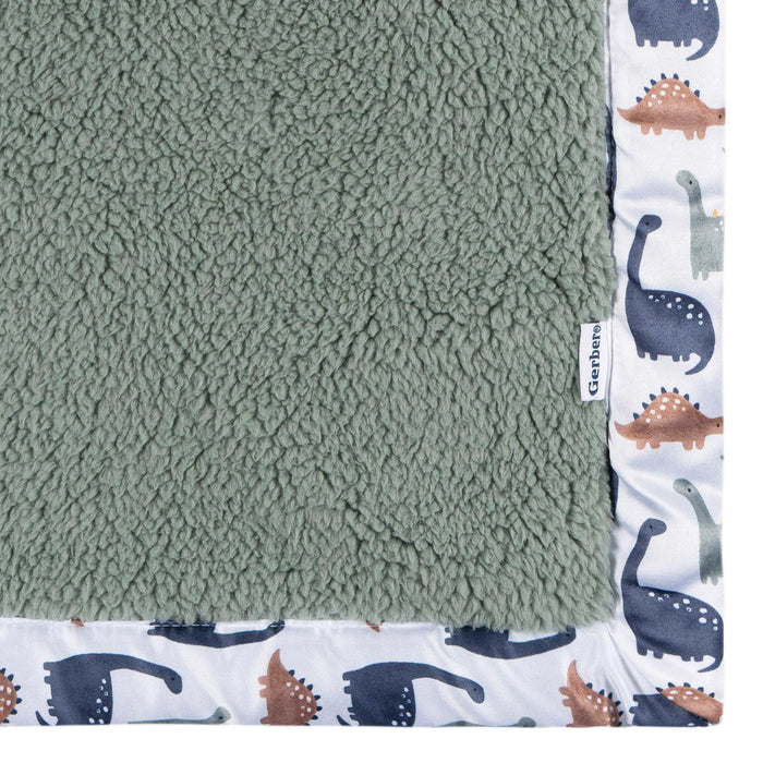 b.box microplush baby blanket with green fleece and dinosaur print border, shown flat.