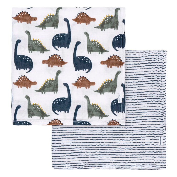 b.box muslin swaddle blanket set with dinosaur and striped patterns neatly folded together.