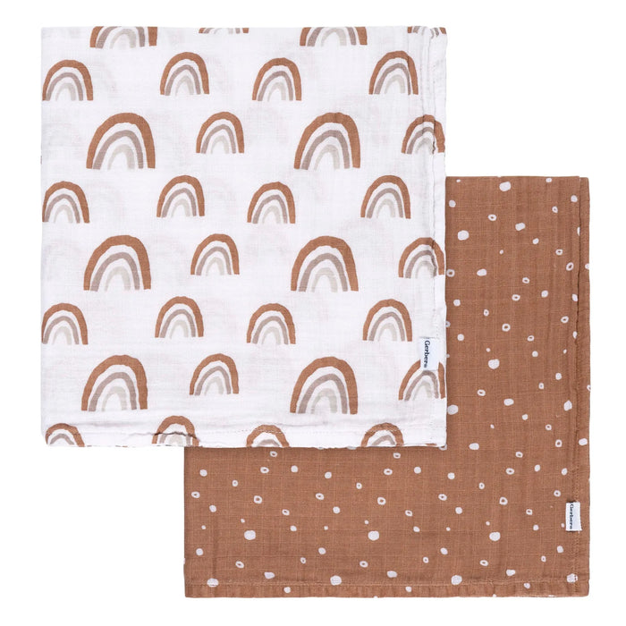 b.box muslin swaddle blanket set with boho rainbow and brown dotted patterns, folded on a flat surface.