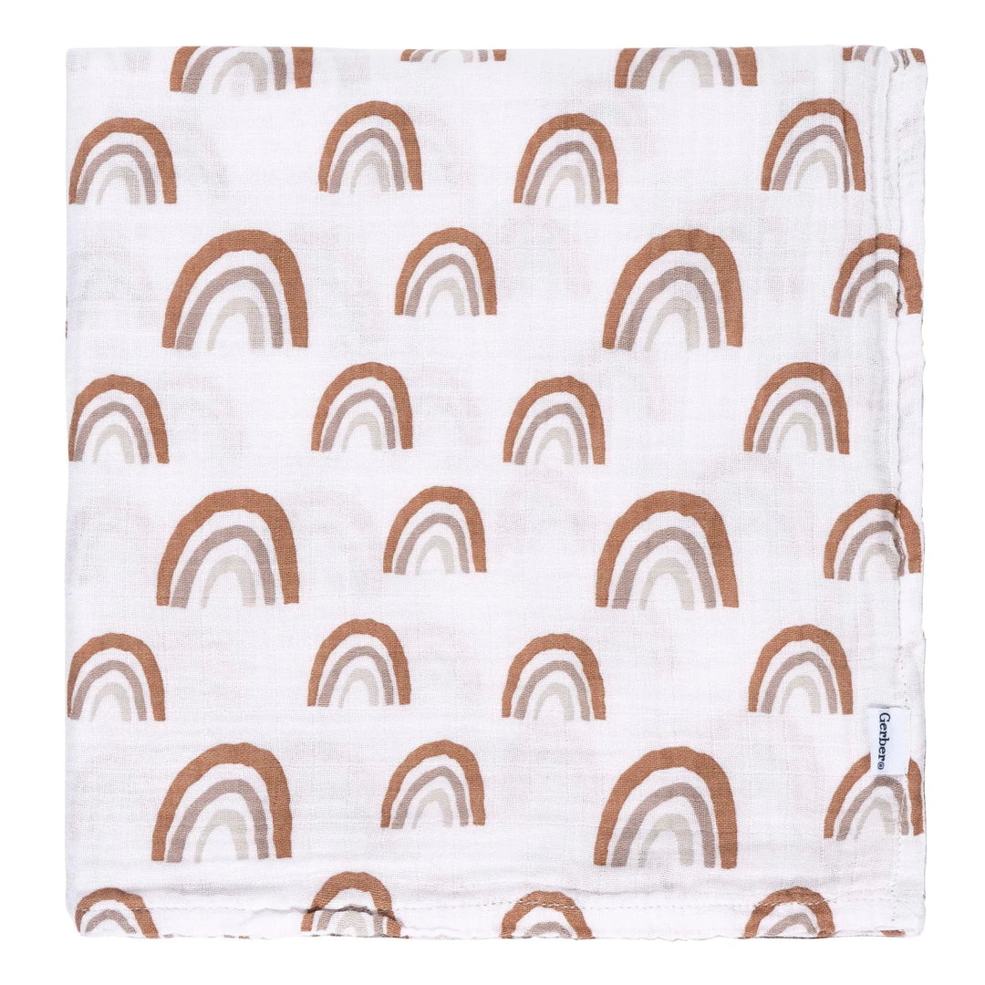 b.box muslin swaddle blanket with brown boho rainbow pattern folded neatly on white background.