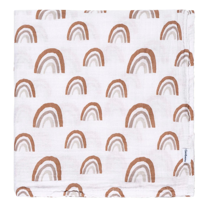 b.box muslin swaddle blanket with brown boho rainbow pattern folded neatly on white background.