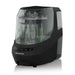 Baby Brezza bottle washer in black shown on a plain surface with bottles and nipples inside